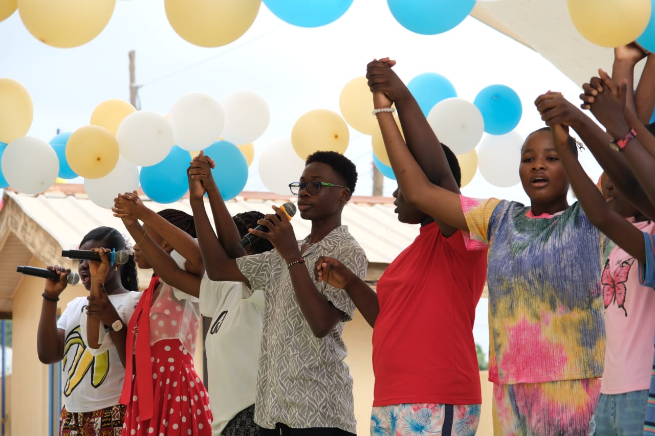 Students singing together at a Stockwell celebration